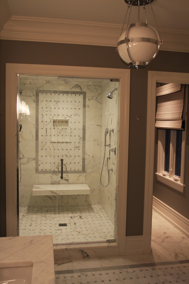 Bathroom - large traditional master white tile and marble tile marble floor and white floor bathroom idea in Chicago with furniture-like cabinets, white cabinets, a two-piece toilet, gray walls, an undermount sink, marble countertops, a hinged shower door and white countertops