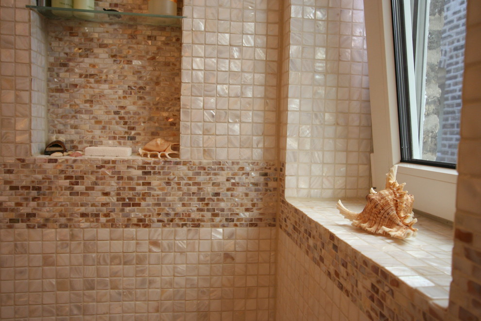 Photo of a medium sized contemporary shower room bathroom in Chicago with a submerged sink, flat-panel cabinets, light wood cabinets, an alcove shower, a two-piece toilet, beige tiles, glass tiles, beige walls and porcelain flooring.