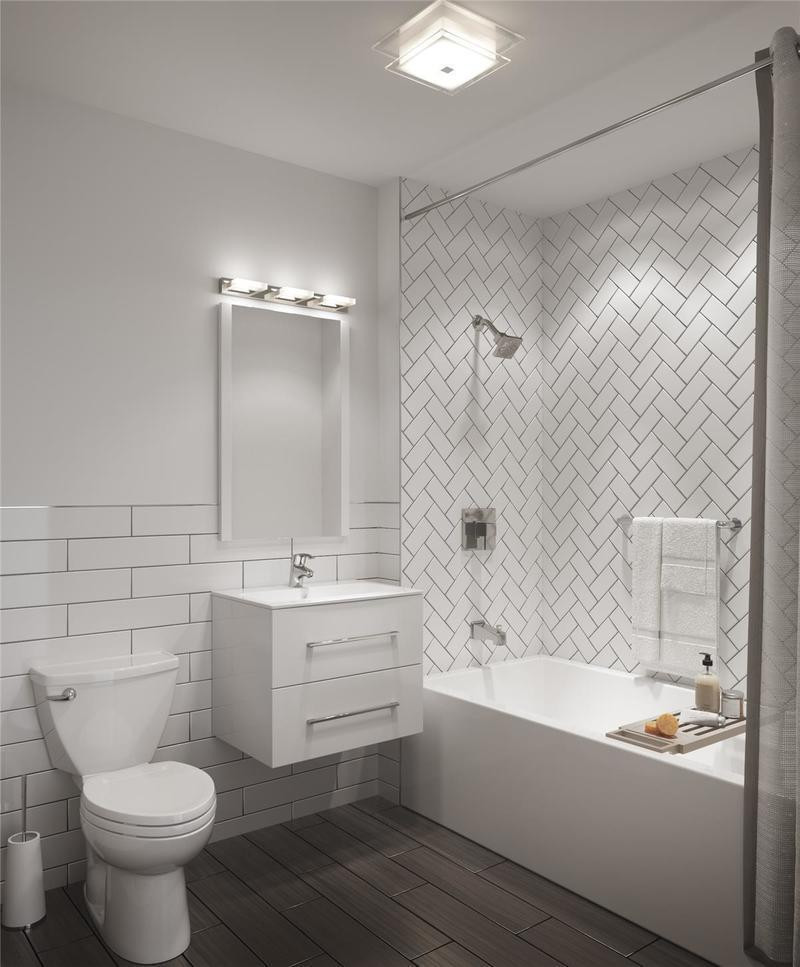 Идея дизайна: маленькая главная ванная комната в современном стиле с плоскими фасадами, белыми фасадами, отдельно стоящей ванной, душем над ванной, унитазом-моноблоком, белой плиткой, плиткой кабанчик, белыми стенами, полом из керамогранита, монолитной раковиной, столешницей из искусственного камня, серым полом, шторкой для ванной, белой столешницей, тумбой под одну раковину и подвесной тумбой для на участке и в саду