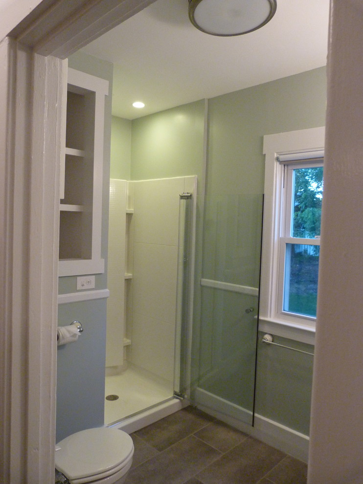 Photo of a small traditional bathroom in Detroit with an alcove shower and grey tiles.