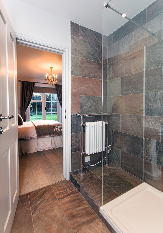 Photo of a small victorian ensuite bathroom in Surrey with a walk-in shower, a two-piece toilet, multi-coloured tiles, slate tiles, grey walls, slate flooring, a console sink, multi-coloured floors and an open shower.