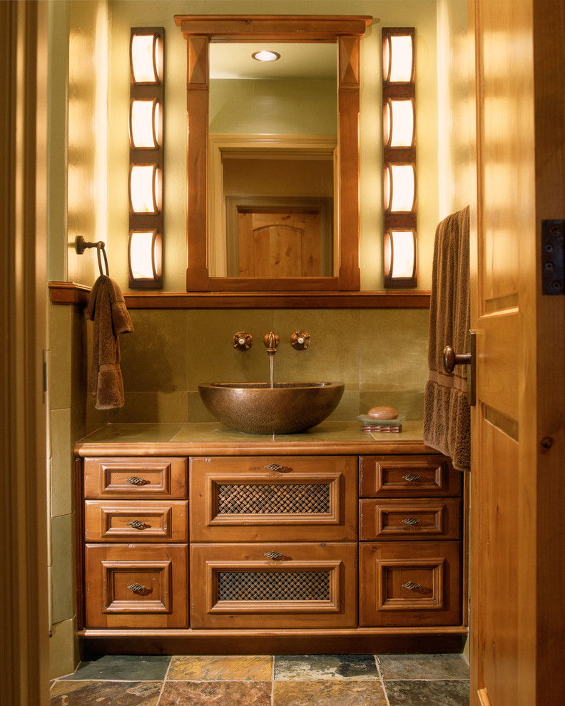 Example of a small transitional 3/4 slate floor and beige floor bathroom design in Denver with tile countertops, a vessel sink, furniture-like cabinets, medium tone wood cabinets and beige walls