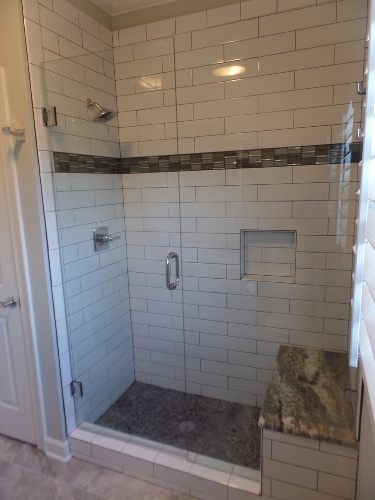 Example of a mid-sized transitional kids' white tile and ceramic tile porcelain tile and gray floor alcove shower design in Other with shaker cabinets, green cabinets, a two-piece toilet, gray walls, an undermount sink, marble countertops and a hinged shower door