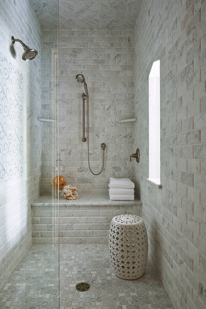 Photo of a classic bathroom in Minneapolis with an alcove shower, grey tiles, marble tiles and a shower bench.