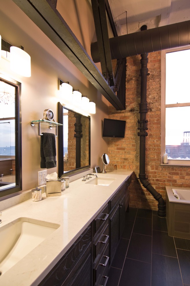 This is an example of an urban ensuite bathroom in Chicago with a submerged sink, raised-panel cabinets, dark wood cabinets, quartz worktops, a built-in bath, a walk-in shower, a one-piece toilet, porcelain tiles, white walls and porcelain flooring.