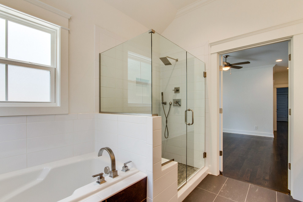 This is an example of a medium sized urban ensuite bathroom in Nashville with a built-in bath, white tiles, metro tiles, white walls, porcelain flooring and a walk-in shower.