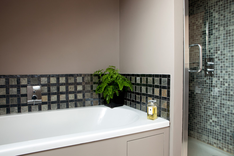 Design ideas for a small contemporary ensuite bathroom in Kent with an alcove bath, green tiles and grey walls.
