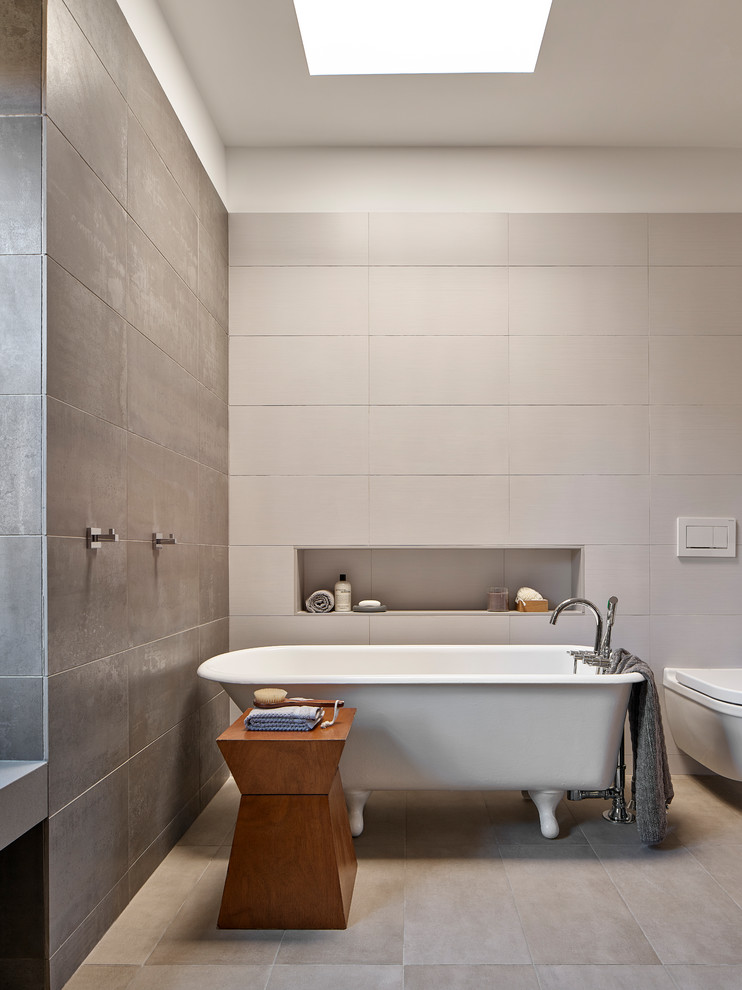 Photo of a modern ensuite bathroom in Philadelphia with a claw-foot bath, grey tiles, porcelain tiles, white walls, terracotta flooring, beige floors and an open shower.