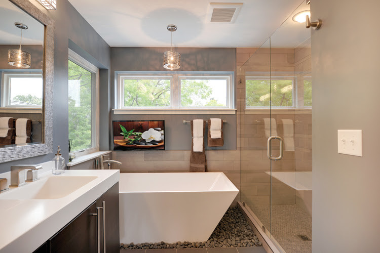 Example of a mid-sized asian master gray tile and porcelain tile porcelain tile bathroom design in Denver with flat-panel cabinets, dark wood cabinets, blue walls, an integrated sink and quartz countertops