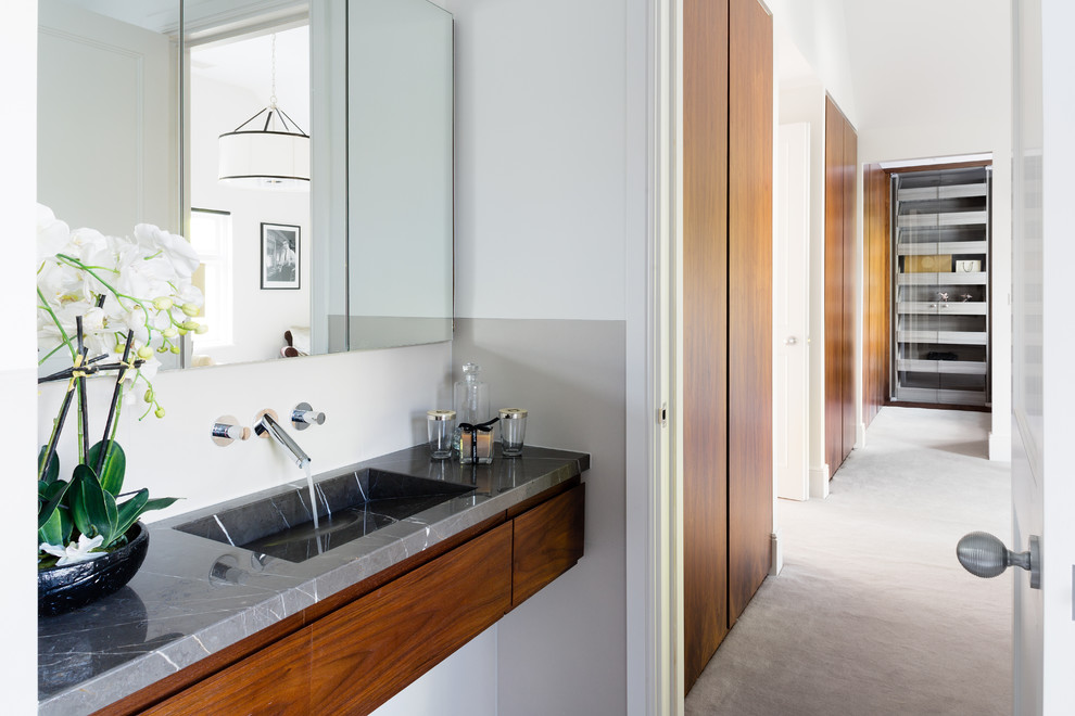 Example of a trendy master bathroom design in London