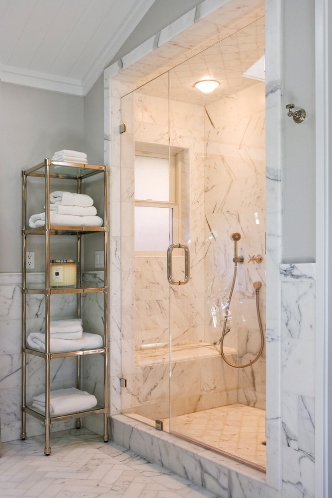 Elegant white tile and marble tile marble floor alcove shower photo in San Francisco
