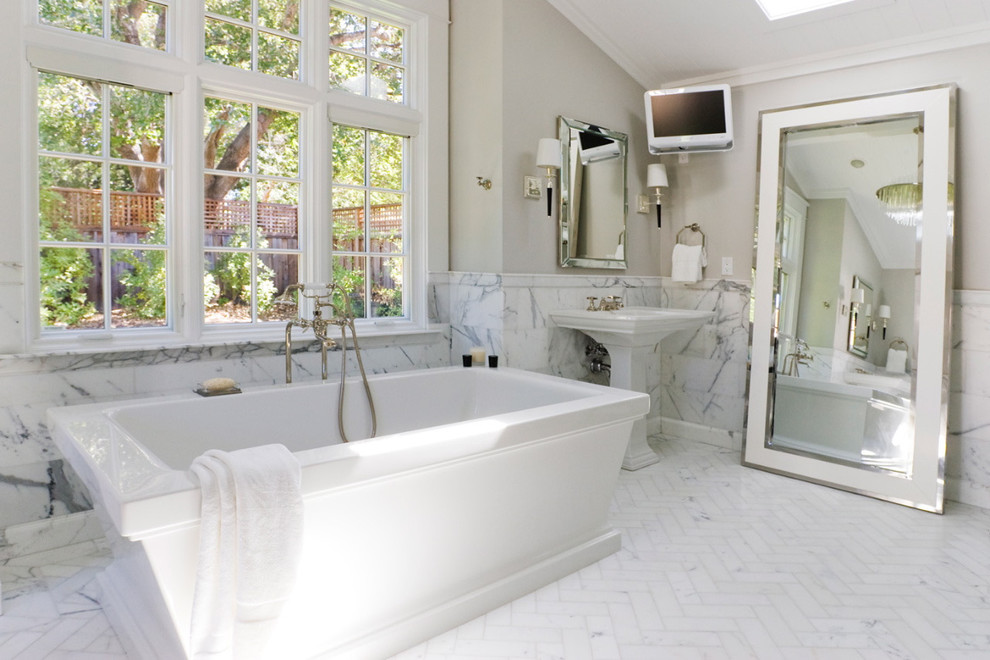 Freestanding bathtub - traditional freestanding bathtub idea in San Francisco with a pedestal sink