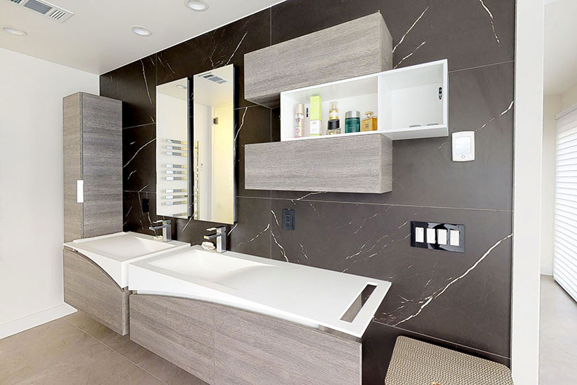 Example of a large minimalist master black tile and ceramic tile ceramic tile and gray floor bathroom design in San Francisco with flat-panel cabinets, gray cabinets, a one-piece toilet, white walls, an integrated sink, quartz countertops, a hinged shower door and white countertops