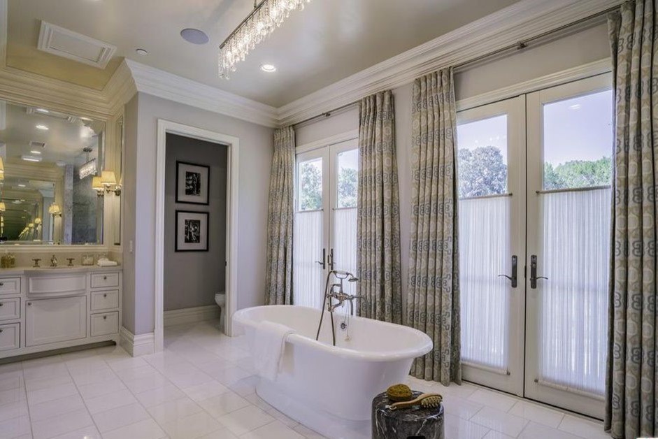 Huge elegant master porcelain tile and white floor bathroom photo in Los Angeles with beaded inset cabinets, white cabinets, gray walls, an undermount sink, quartzite countertops, a hinged shower door and white countertops