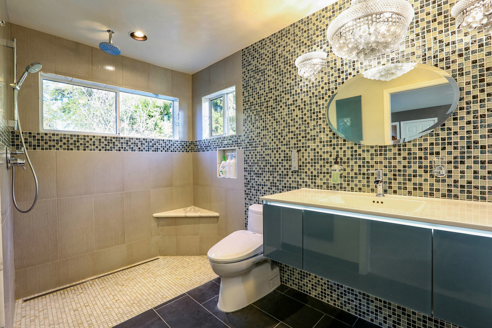 Medium sized contemporary ensuite bathroom in San Francisco with flat-panel cabinets, grey cabinets, a built-in bath, a built-in shower, a one-piece toilet, white tiles, marble tiles, white walls, porcelain flooring, an integrated sink, engineered stone worktops, grey floors, an open shower and white worktops.