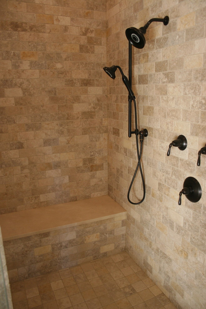 Double shower - large traditional master beige tile and stone tile travertine floor double shower idea in Chicago with white cabinets and beige walls