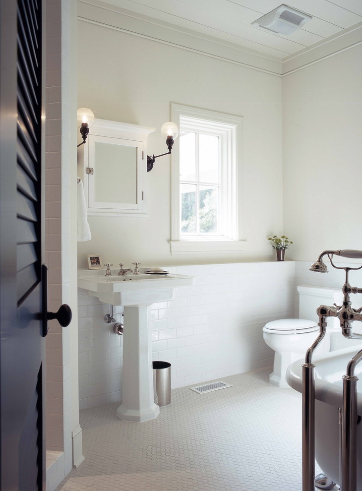 Inspiration for a timeless subway tile bathroom remodel in Atlanta with a pedestal sink