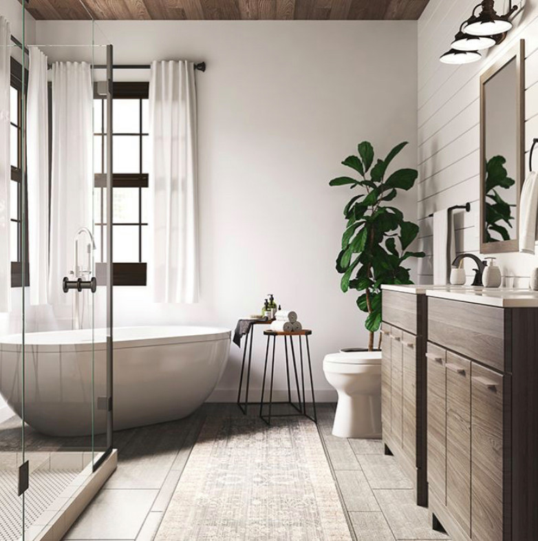 Lantlig inredning av ett mellanstort brun brunt en-suite badrum, med släta luckor, skåp i mellenmörkt trä, ett fristående badkar, en öppen dusch, en toalettstol med separat cisternkåpa, vit kakel, porslinskakel, vita väggar, klinkergolv i porslin, ett nedsänkt handfat, bänkskiva i kvarts, grått golv och med dusch som är öppen