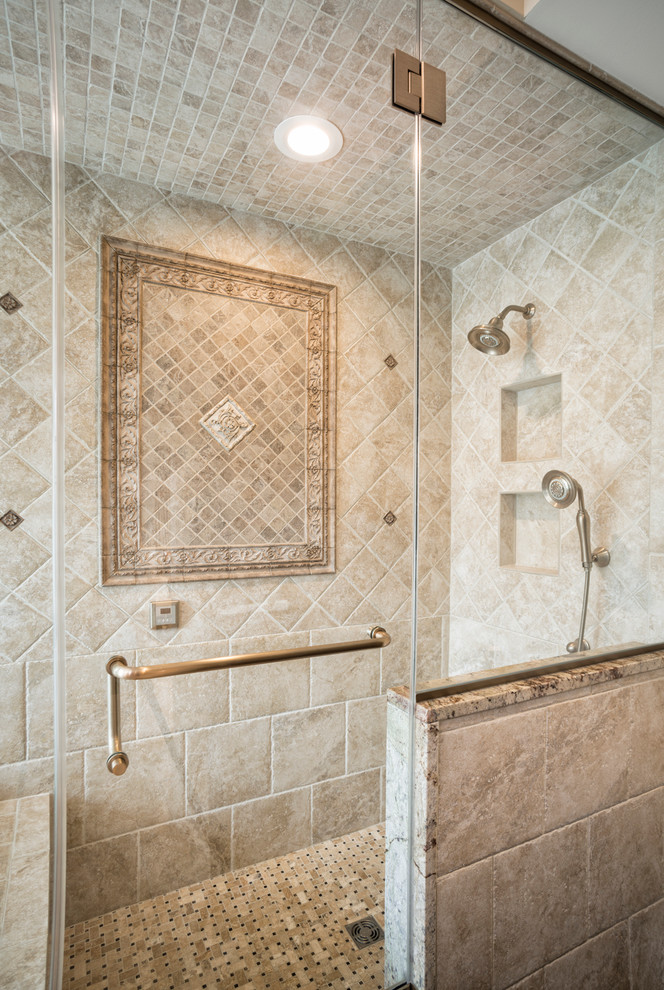 Bathroom - mid-sized traditional beige tile and porcelain tile porcelain tile bathroom idea in Philadelphia with an undermount sink, raised-panel cabinets, medium tone wood cabinets, granite countertops, a two-piece toilet and beige walls