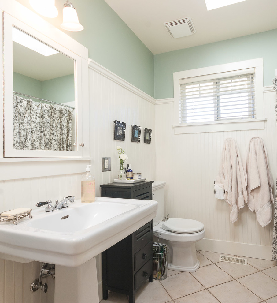 Example of a classic bathroom design in Vancouver with a pedestal sink