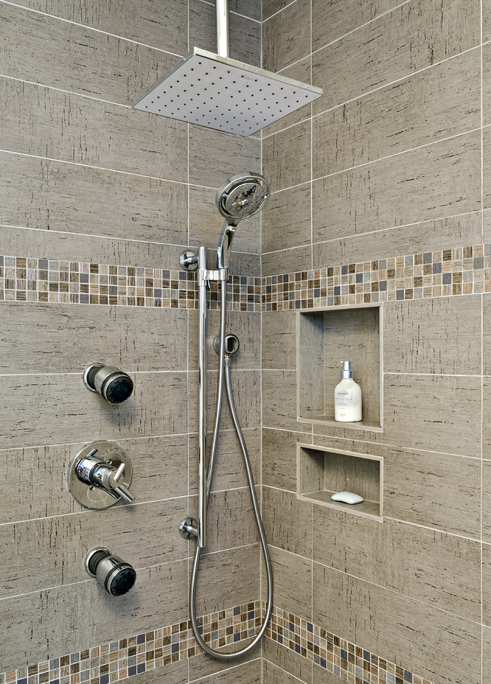 Trendy gray tile and porcelain tile bathroom photo in Minneapolis with an undermount sink, flat-panel cabinets, medium tone wood cabinets, quartz countertops and a one-piece toilet