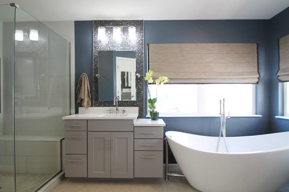 Design ideas for an expansive classic ensuite bathroom in Denver with shaker cabinets, grey cabinets, a freestanding bath, a corner shower, a one-piece toilet, white tiles, porcelain tiles, blue walls, porcelain flooring, a submerged sink and engineered stone worktops.