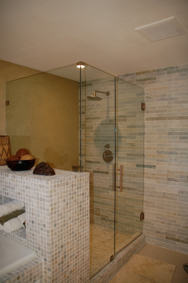 Photo of a medium sized contemporary ensuite bathroom in San Francisco with flat-panel cabinets, medium wood cabinets, a submerged bath, multi-coloured tiles, yellow walls and a pedestal sink.