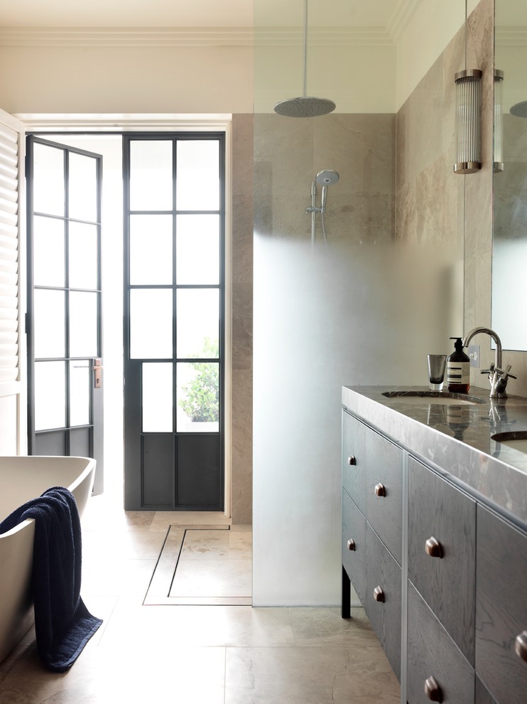 На фото: ванная комната в стиле неоклассика (современная классика) с темными деревянными фасадами, мраморной столешницей, открытым душем, коричневой плиткой, плиткой из листового камня, мраморным полом и врезной раковиной с