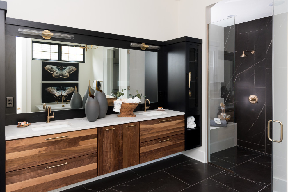 Design ideas for a medium sized contemporary ensuite wet room bathroom in Indianapolis with flat-panel cabinets, medium wood cabinets, marble flooring, a submerged sink, engineered stone worktops, black floors, a hinged door, white worktops, double sinks and a built in vanity unit.