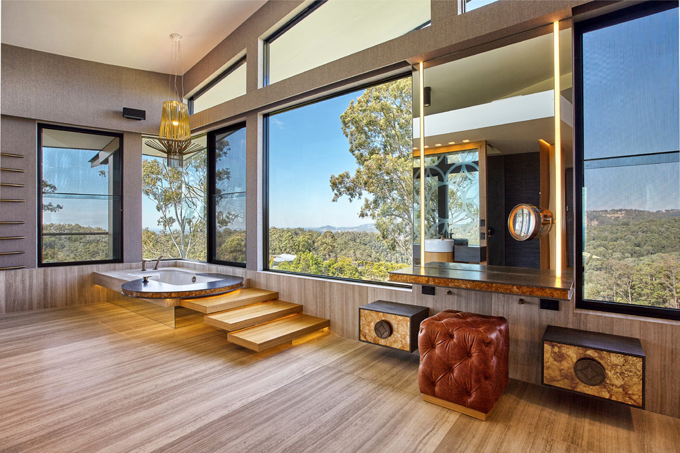 Bathroom - large contemporary bathroom idea in Sydney with solid surface countertops