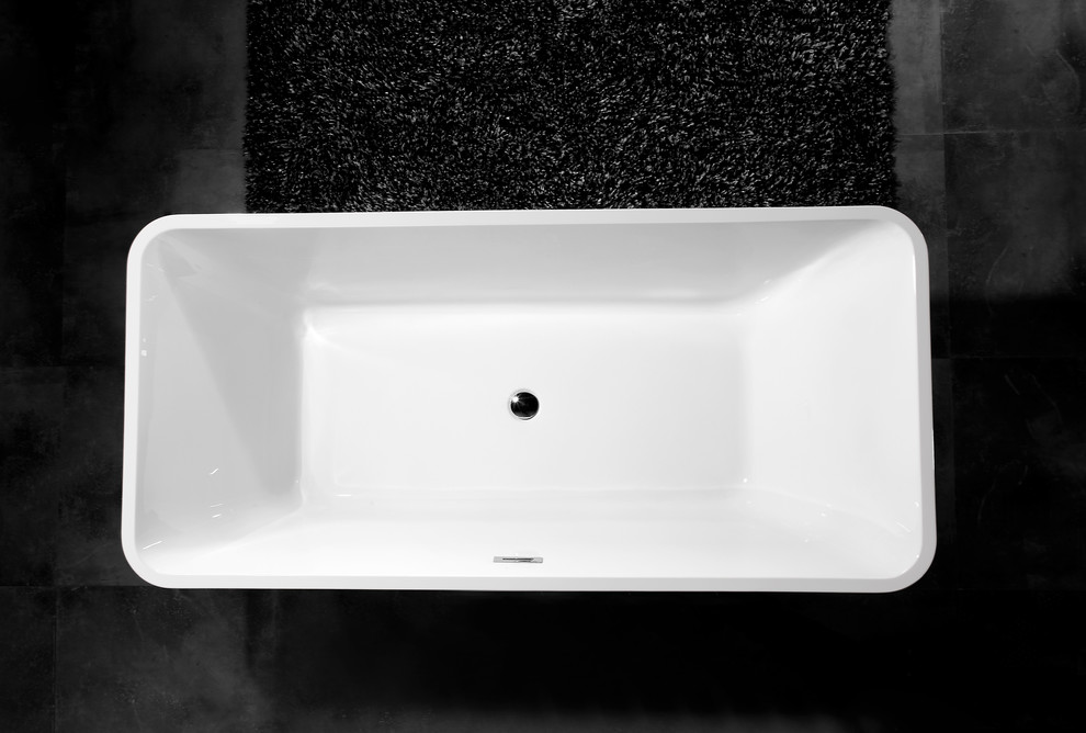 Esempio di una grande stanza da bagno padronale minimalista con vasca freestanding