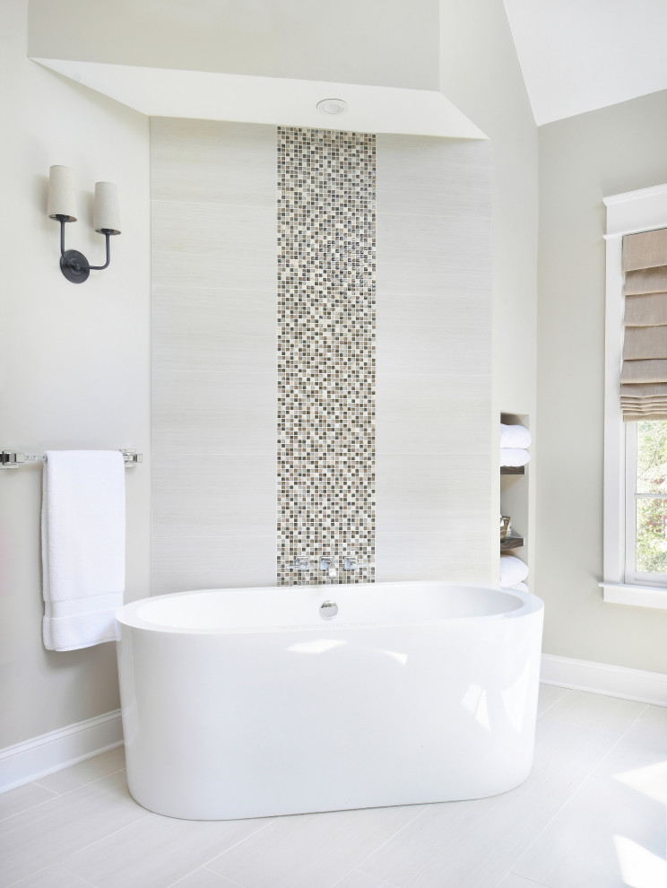 Example of a large transitional master beige floor freestanding bathtub design in Atlanta with beige walls