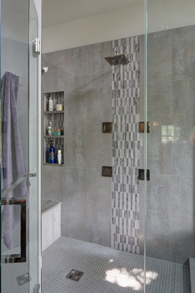 This is an example of a medium sized classic ensuite bathroom in Chicago with a vessel sink, flat-panel cabinets, dark wood cabinets, a freestanding bath, a corner shower, grey tiles and porcelain tiles.