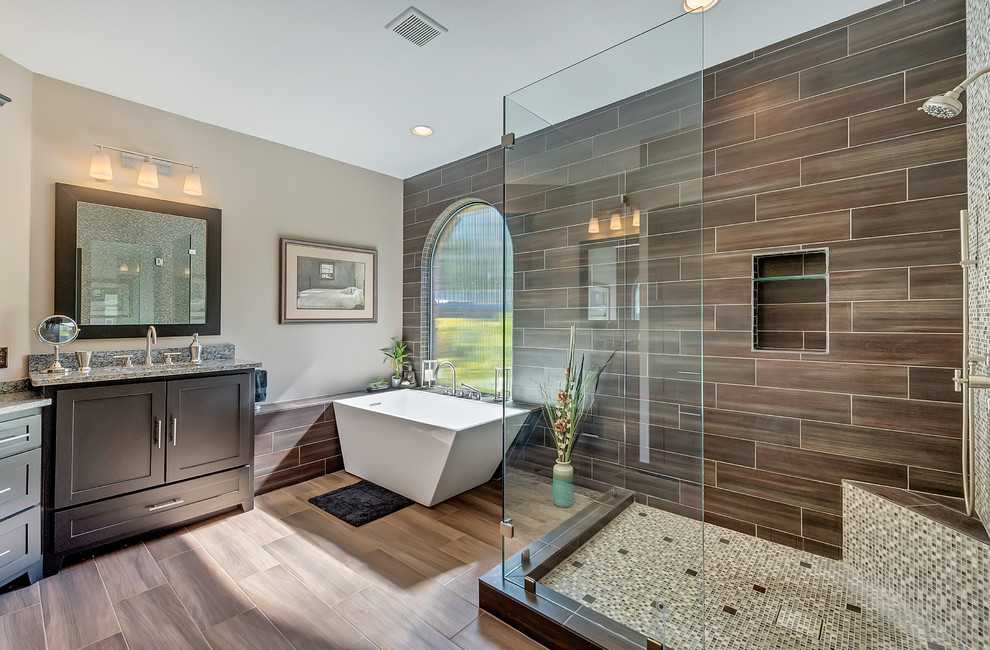 Example of a large transitional master multicolored tile and mosaic tile porcelain tile and beige floor bathroom design in Dallas with shaker cabinets, gray cabinets, beige walls, an undermount sink and granite countertops
