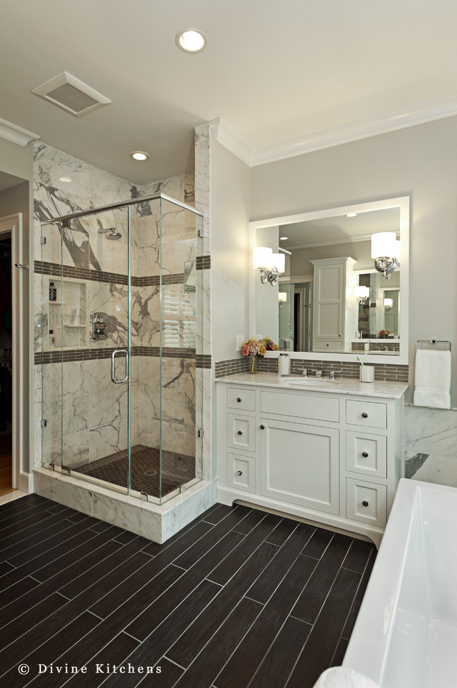 Inspiration for a large timeless master brown tile and porcelain tile porcelain tile bathroom remodel in Boston with an undermount sink, beaded inset cabinets, white cabinets, marble countertops, a two-piece toilet and gray walls