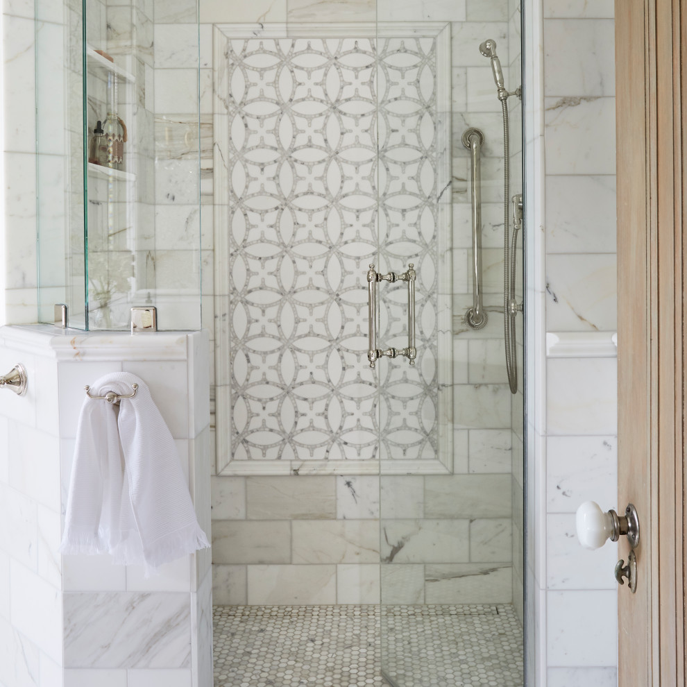 Example of a mid-sized classic master white tile and subway tile mosaic tile floor, white floor, single-sink and wallpaper walk-in shower design in Chicago with recessed-panel cabinets, gray cabinets, a one-piece toilet, gray walls, an undermount sink, quartzite countertops, a hinged shower door, white countertops and a niche
