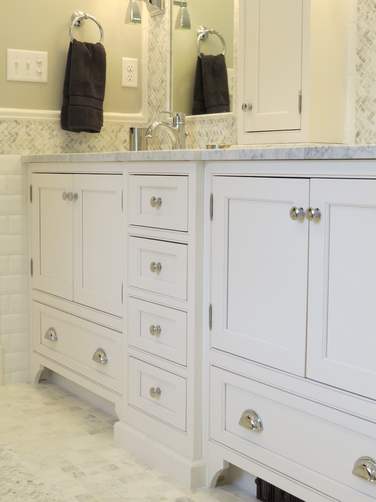 Mid-sized elegant master multicolored tile and mosaic tile marble floor bathroom photo in Portland Maine with an undermount sink, beaded inset cabinets, white cabinets, marble countertops, a wall-mount toilet and gray walls