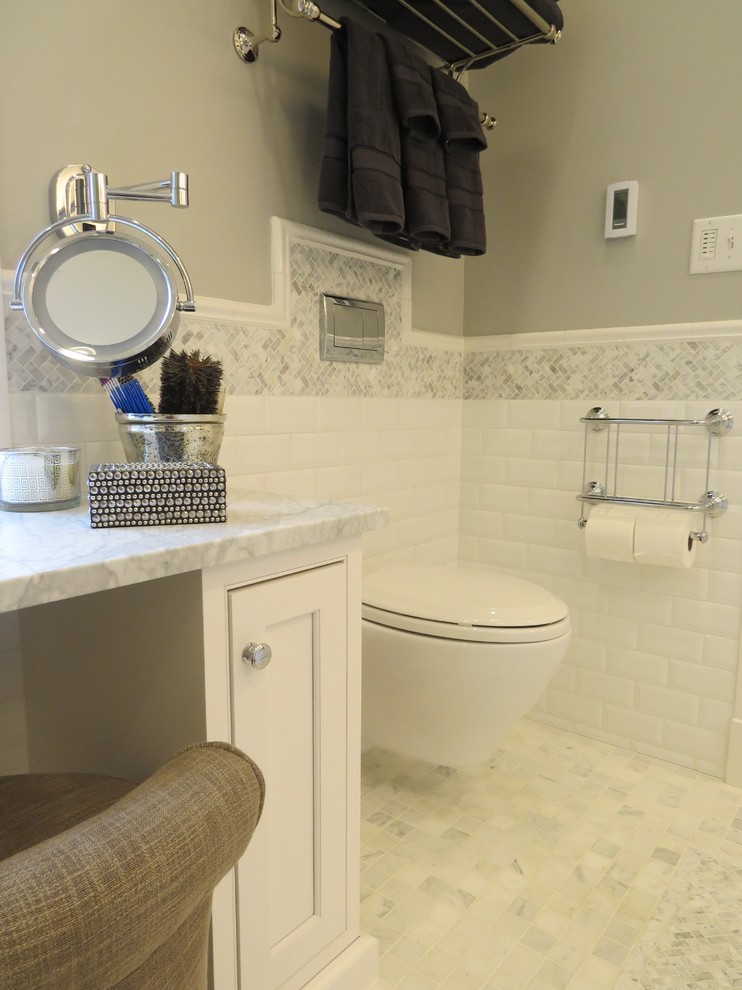 Example of a mid-sized classic master white tile and subway tile marble floor bathroom design in Portland Maine with an undermount sink, beaded inset cabinets, white cabinets, marble countertops, a wall-mount toilet and gray walls