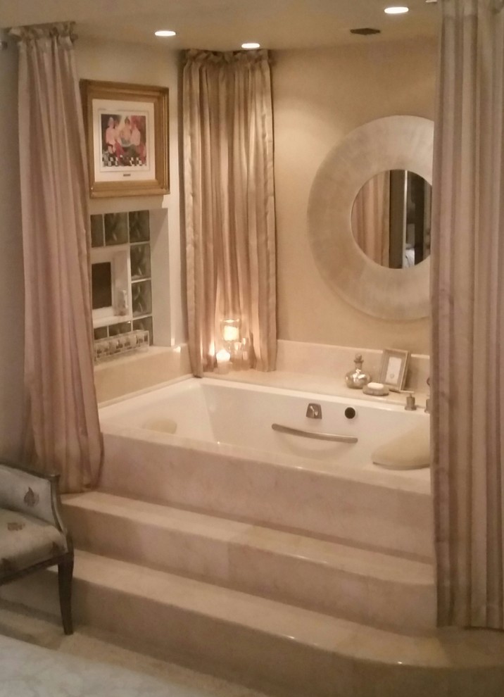 Photo of a contemporary bathroom in Tampa with a corner bath.