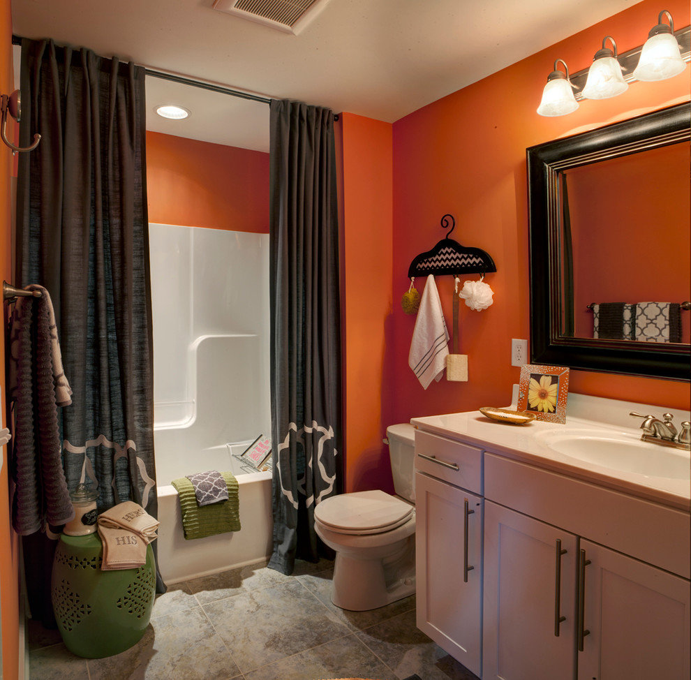 Small transitional master gray tile and ceramic tile ceramic tile bathroom photo in Other with an integrated sink, shaker cabinets, white cabinets, marble countertops, a one-piece toilet and orange walls