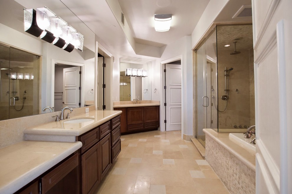 Large mid-century modern master beige tile marble floor bathroom photo in Las Vegas with a drop-in sink, flat-panel cabinets, dark wood cabinets, granite countertops, a one-piece toilet and white walls