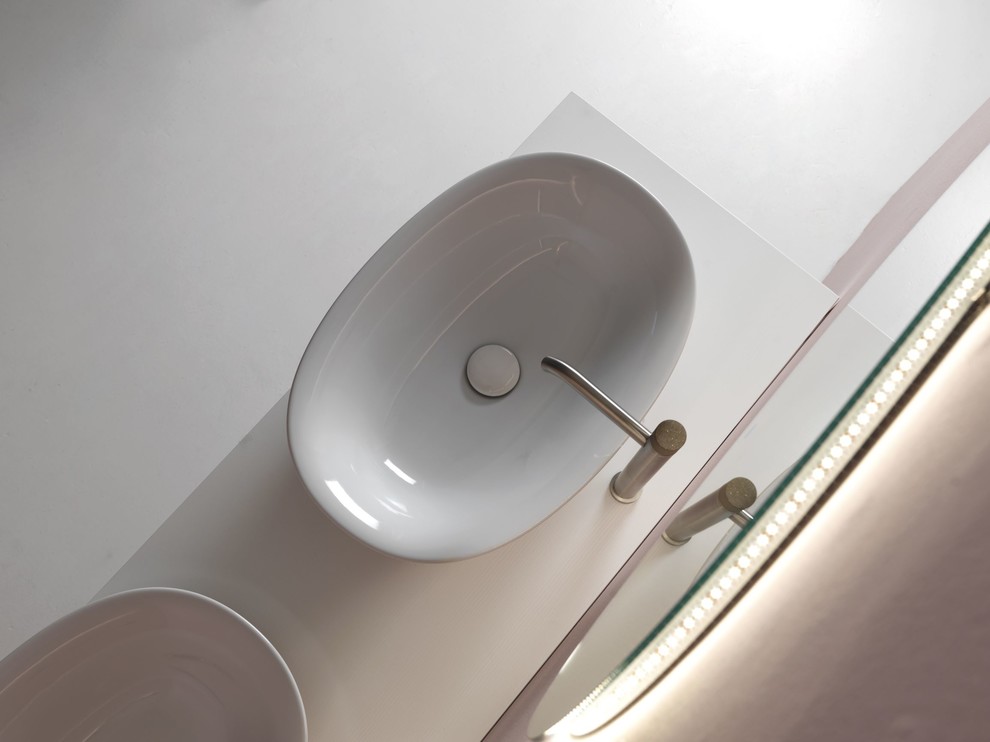 Inspiration for a contemporary bathroom in London with a vessel sink.