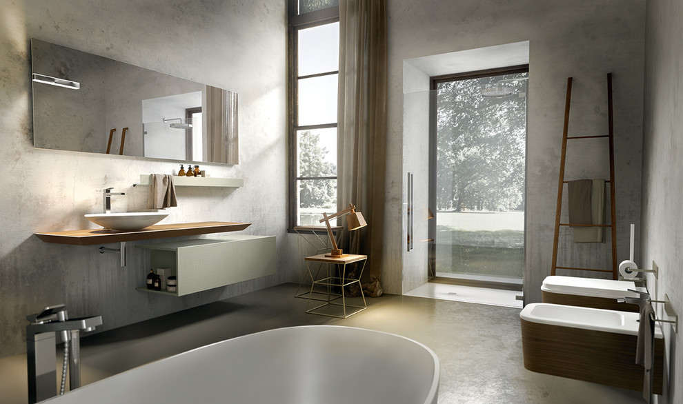 Inspiration for a large modern master concrete floor bathroom remodel in New York with a vessel sink, furniture-like cabinets, light wood cabinets, wood countertops and a one-piece toilet