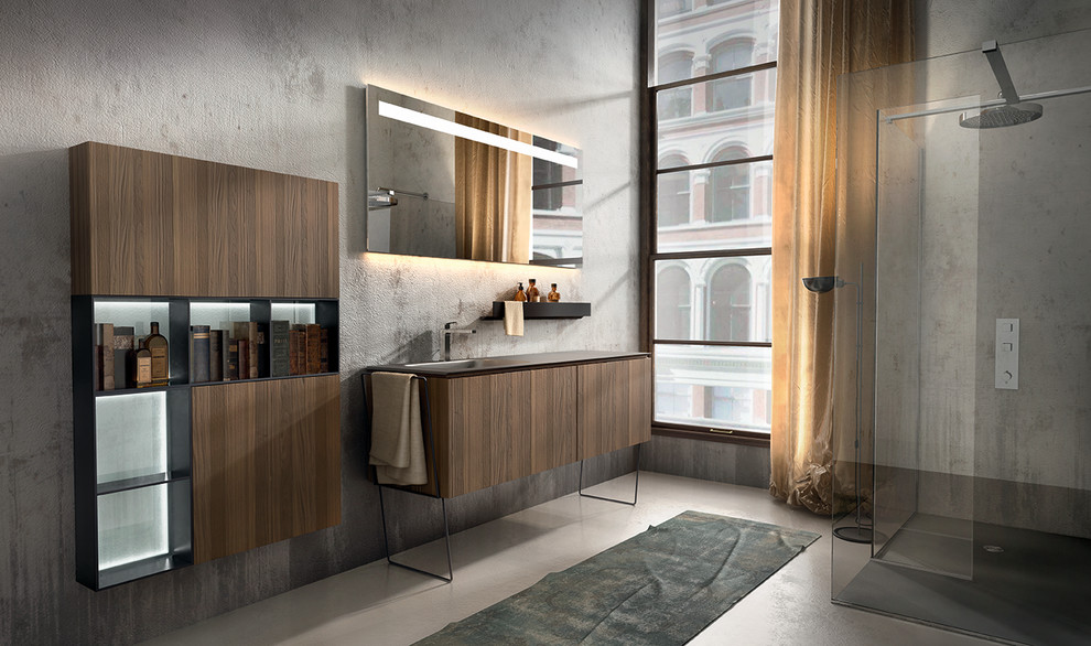 Corner shower - large modern master concrete floor corner shower idea in New York with an integrated sink, furniture-like cabinets, medium tone wood cabinets, solid surface countertops and a one-piece toilet