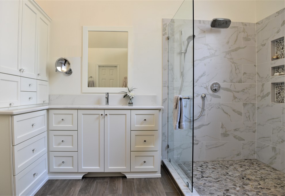 Design ideas for a medium sized classic ensuite wet room bathroom in Atlanta with shaker cabinets, a freestanding bath, marble tiles, quartz worktops and an open shower.