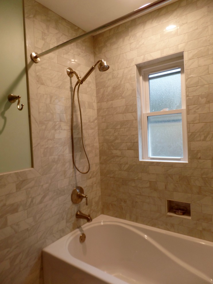 Medium sized traditional family bathroom in Other with freestanding cabinets, distressed cabinets, an alcove bath, a shower/bath combination, a two-piece toilet, grey tiles, porcelain tiles, green walls, ceramic flooring, a submerged sink and granite worktops.