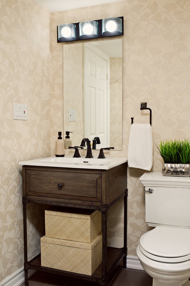 Mid-sized elegant 3/4 dark wood floor bathroom photo in Toronto with dark wood cabinets, a two-piece toilet, beige walls, a drop-in sink and raised-panel cabinets