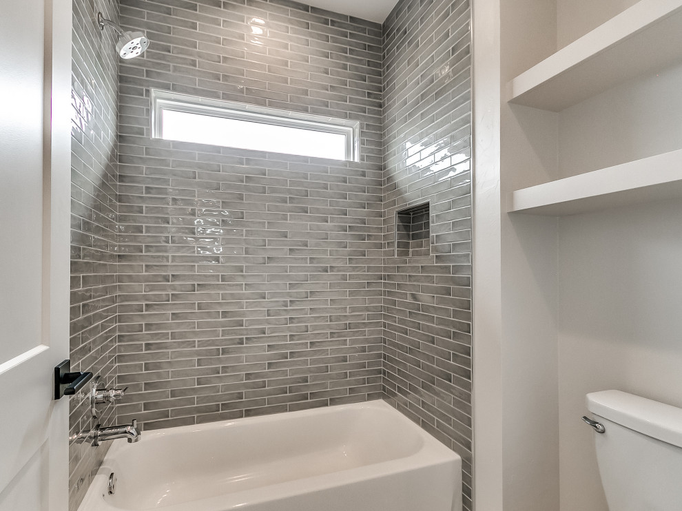 Design ideas for a traditional family bathroom in Oklahoma City with ceramic tiles.