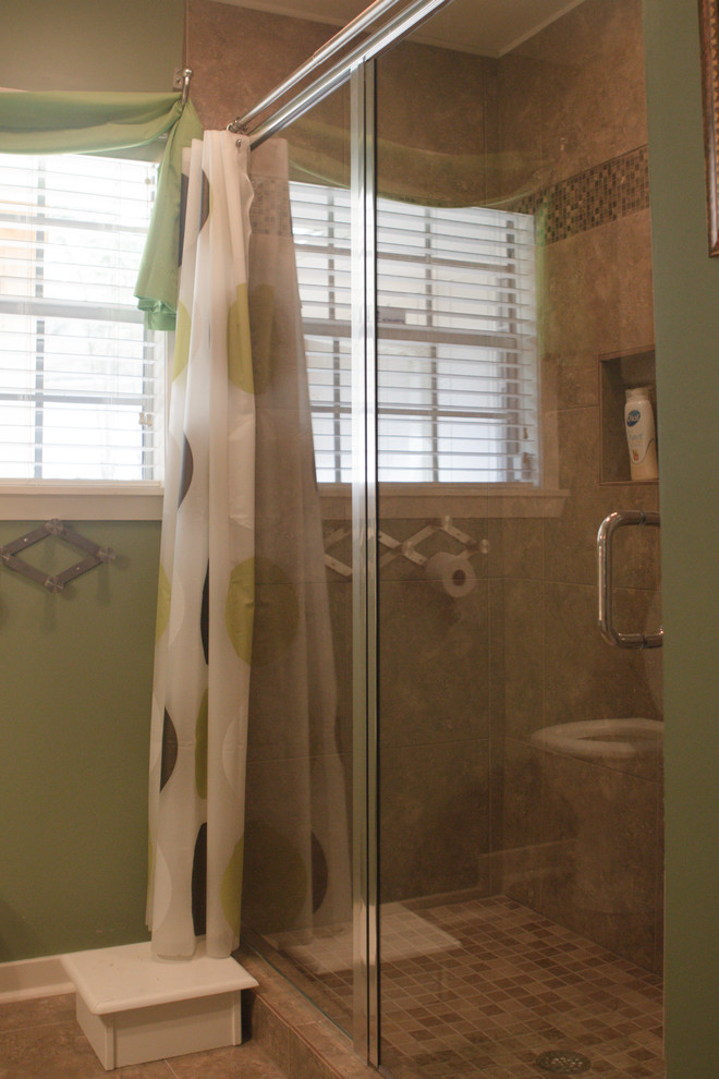 Mid-sized elegant 3/4 brown tile and ceramic tile ceramic tile alcove shower photo in Jackson with a two-piece toilet and green walls