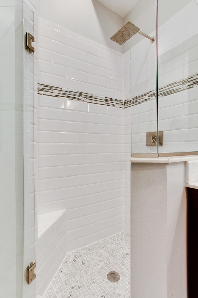 Large transitional master white tile and stone tile marble floor corner shower photo in New Orleans with an undermount sink, flat-panel cabinets, dark wood cabinets, marble countertops, a two-piece toilet and gray walls